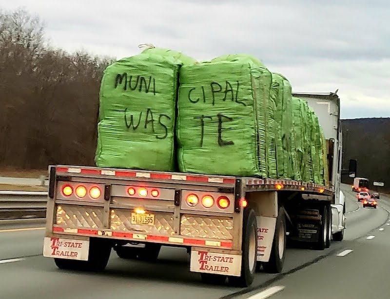 Truck hauling municipal waste